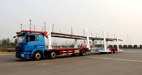 All kinds of car transporters drive to the national market